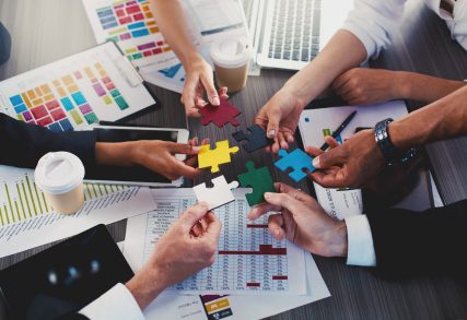 Team building with colorful puzzle pieces